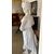 White Carrara marble statue depicting a female figure     