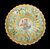 Alzata-crespina in maiolica baccellata con decori vegetali,geometrici e medaglione nell’umbone con Madonna e Gesu’Bambino.Deruta.