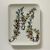 FORNASETTI, Tray ashtray with ceramic floral decoration     