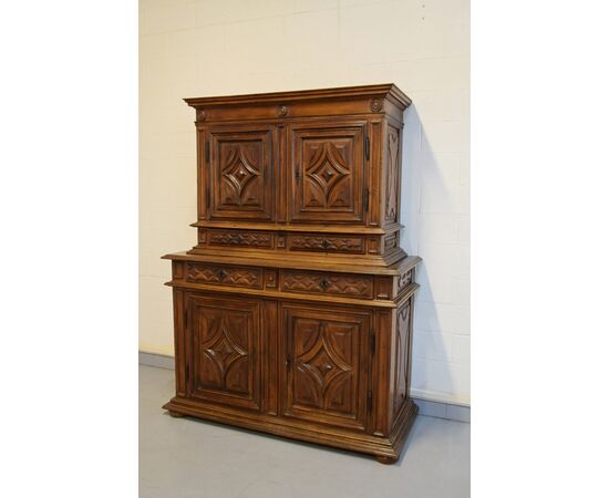 Double body cabinet in carved walnut, Piedmont, 17th century     