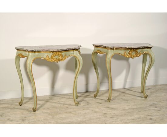 Pair of consoles in carved, lacquered and gilded wood, Venice, early 19th century, Louis XV style     