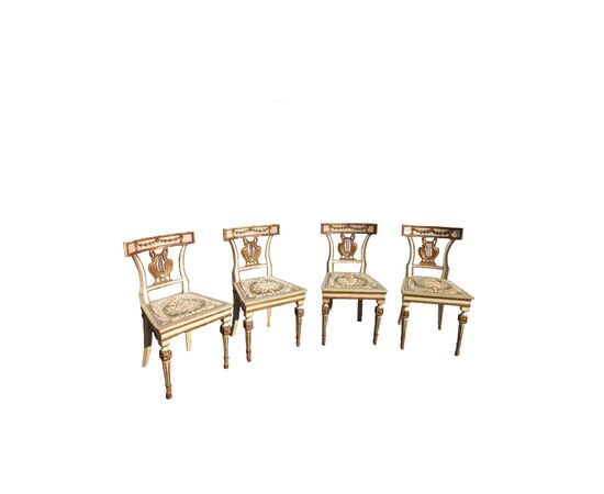 gruppo di quattro sedie laccate dorate