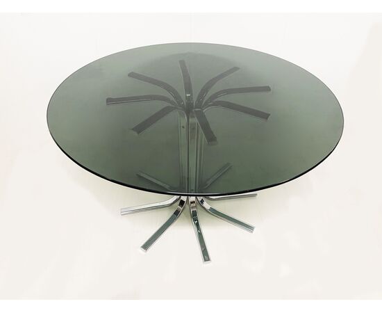 Contemporary table in steel and smoked glass     