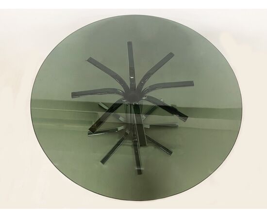 Contemporary table in steel and smoked glass     