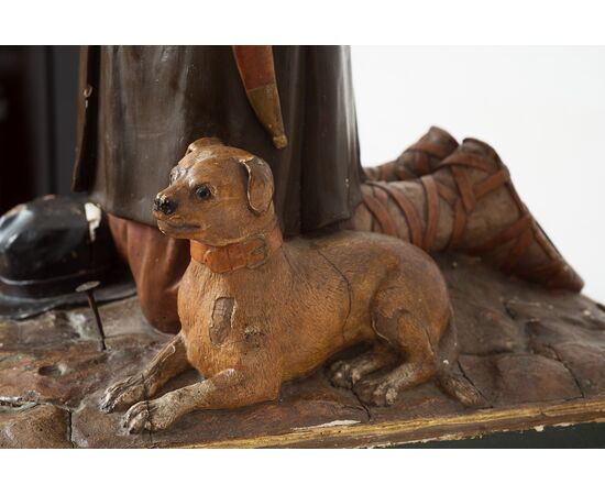 Carved wooden sculpture depicting San Rocco with the dog from the 18th century     