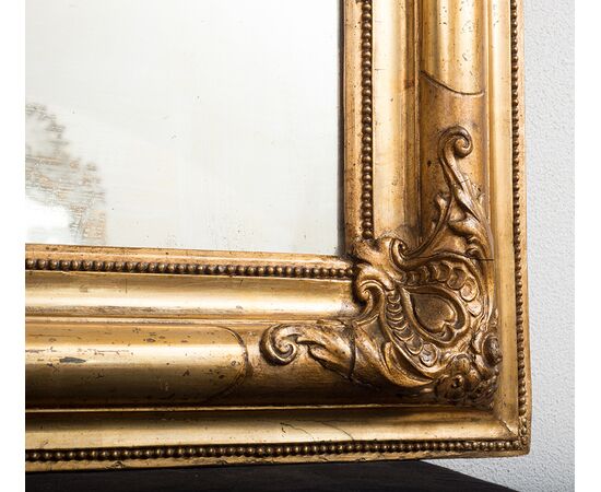 Specchiera antica Francese in legno dorato e intagliato. Periodo XIX secolo.