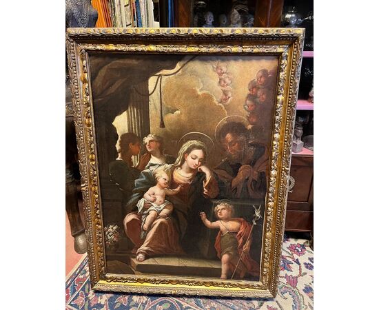 Pittore del XVII-XVIII secolo. Sacra famiglia con San Giovannino. Olio su tela, cm 110x80.