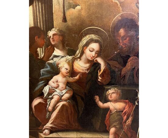 Pittore del XVII-XVIII secolo. Sacra famiglia con San Giovannino. Olio su tela, cm 110x80.