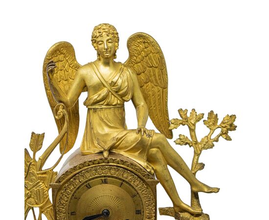 Clock with Eros at rest and frieze of cherubs, 19th century     