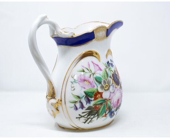 Late 19th century. Jug with floral decoration     