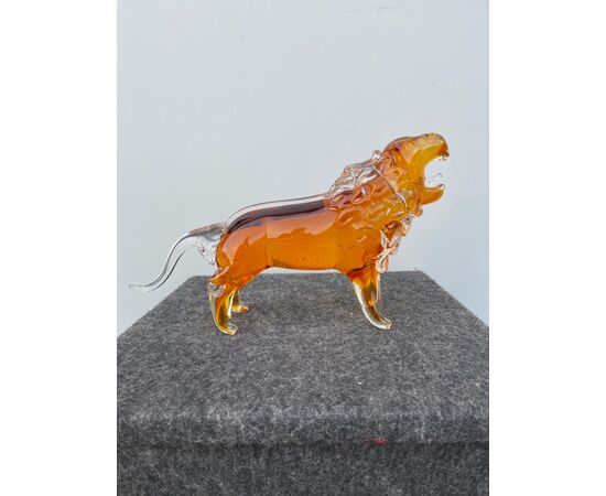 Heavy submerged glass lion with metal oxide inclusion.Barovier     