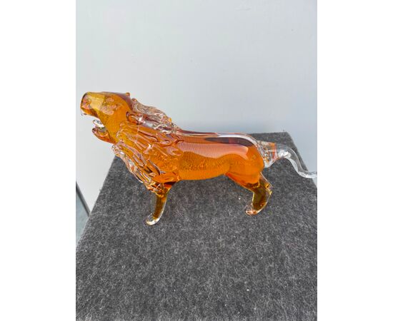 Heavy submerged glass lion with metal oxide inclusion.Barovier     