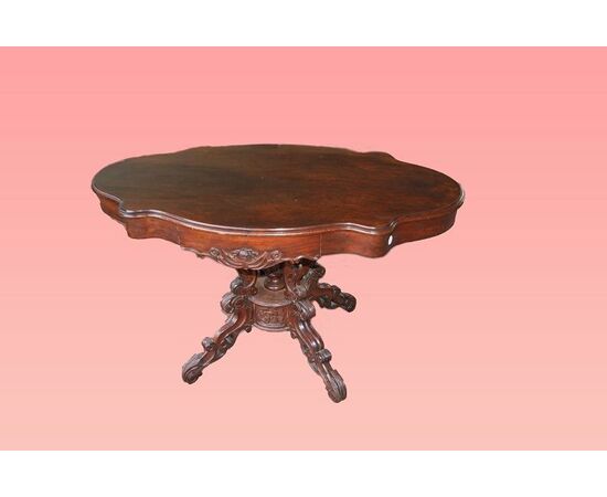 Tavolino sagomato francese stile Luigi Filippo del 1800 in legno di mogano con cassetto e basamento intaglaito