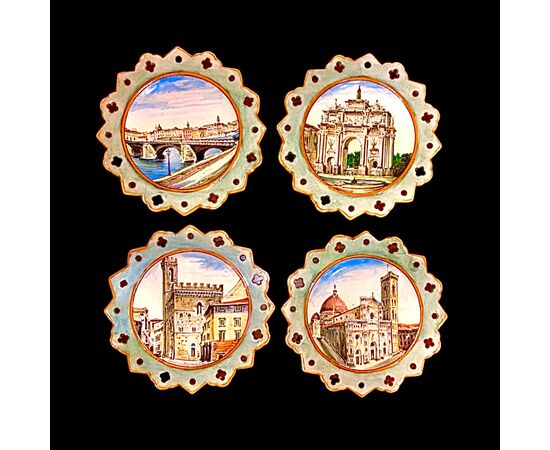 Serie di 4 piattini in maiolica  con tesa traforata e decoro centrale con scene di Firenze.Manifattura Ginori.
