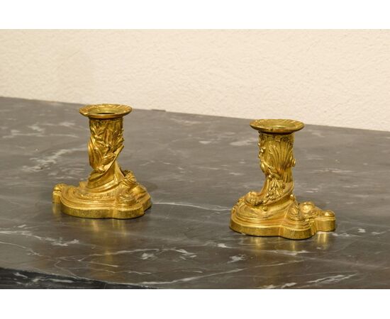 Pair of small gilt bronze candlesticks, France, 19th century, Louis XV style     