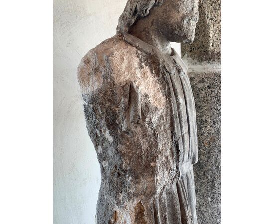 Ancient marble sculpture depicting a pilgrim from the high ages     