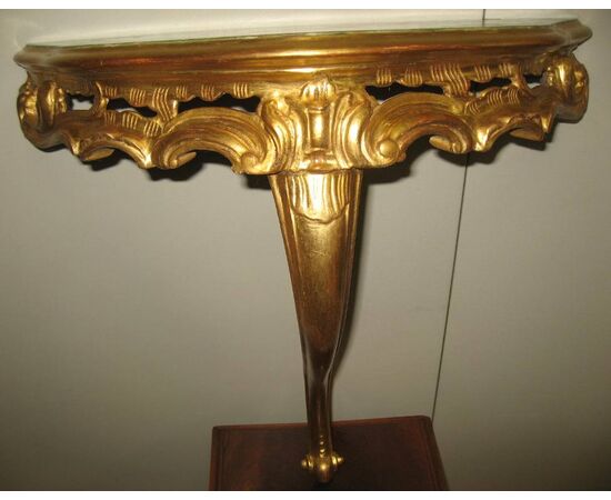 Antique style golden console table. Vintage     