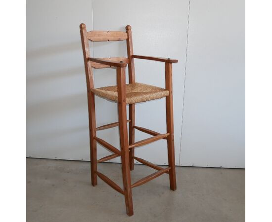 High chair with large armrests. Vintage     