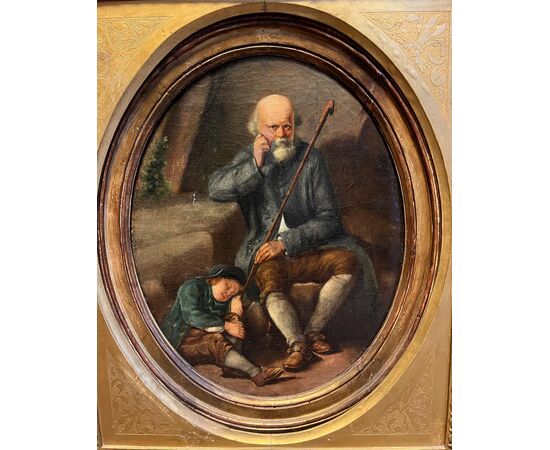 Pittore del XIX secolo. Vecchio con bambino.  Olio su tavola ovale dentro cornice dorata, cm 45x35. 