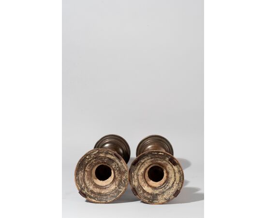 Rome, 16th Century, Pair of brown patina bronze candlesticks     