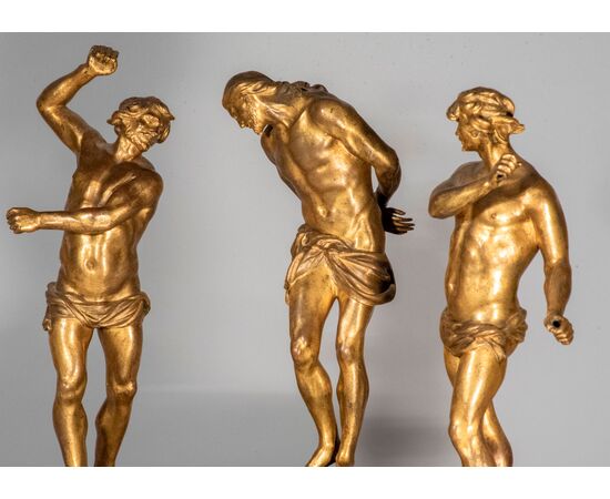 Workshop of Francois Duquesnoy, (Brussels 1597 - Livorno 1643), The Flagellation, group of three figures in gilt bronze     