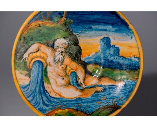 Workshop of Mastro Domenico, Venice, around 1550, Plate decorated with an Allegory of a River in polychrome Majolica     