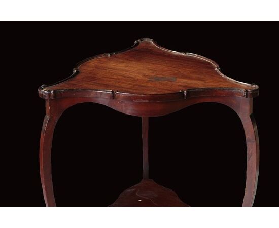 Antique Edwardian triangular coffee table from the early 1900s in mahogany     