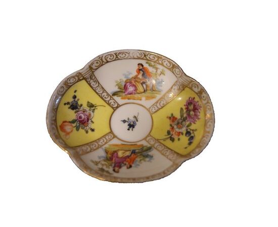 Tazzina con piattino in porcellana gialla Meissen del 1800