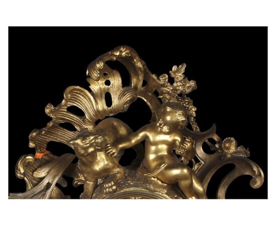 Stupendo orologio in bronzo dorato in stile barocco francese del 1800 con putti
