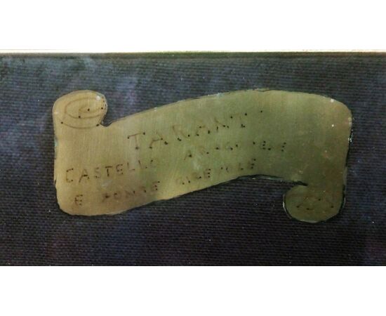 Painted on the brass plate embossed