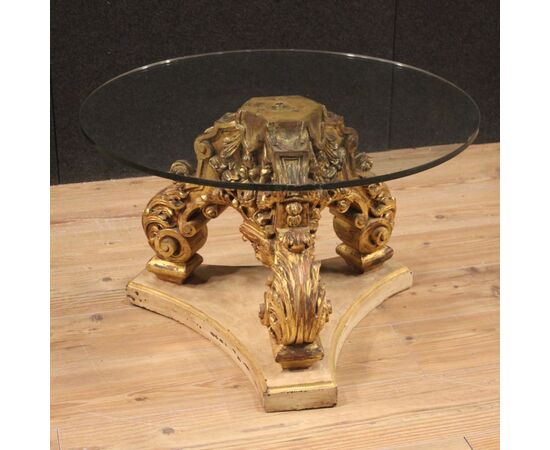 Italian lacquered and gilded round coffee table with glass top