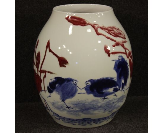 Chinese painted ceramic vase with floral and animal decorations