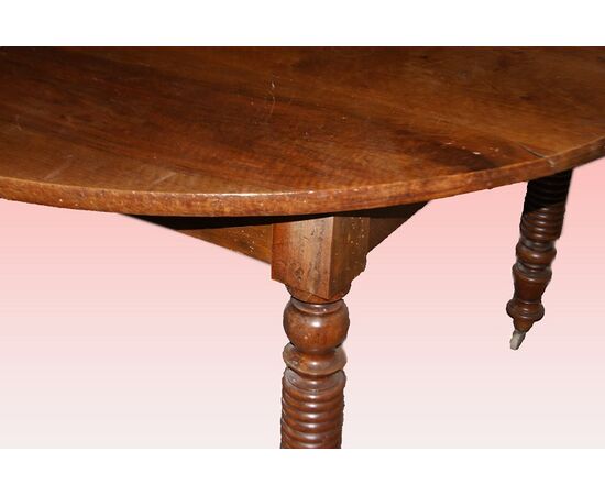 Tavolo circolare allungabile francese di inizio 1800 in legno di noce 