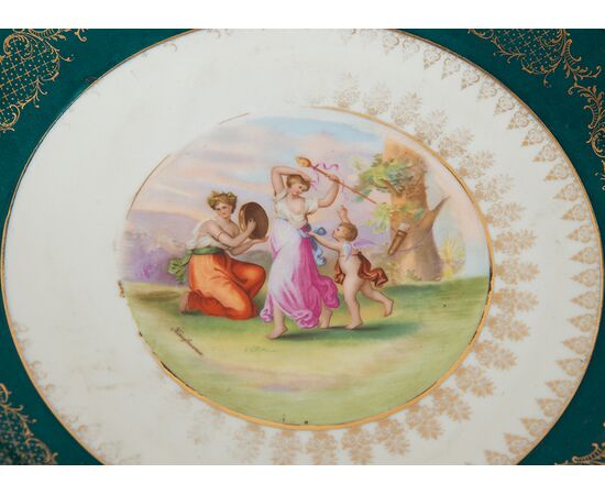 Lotto di sei piatti in porcellana policroma di Vienna firmati"A Kauffmann".Periodo inizio XX secolo.
