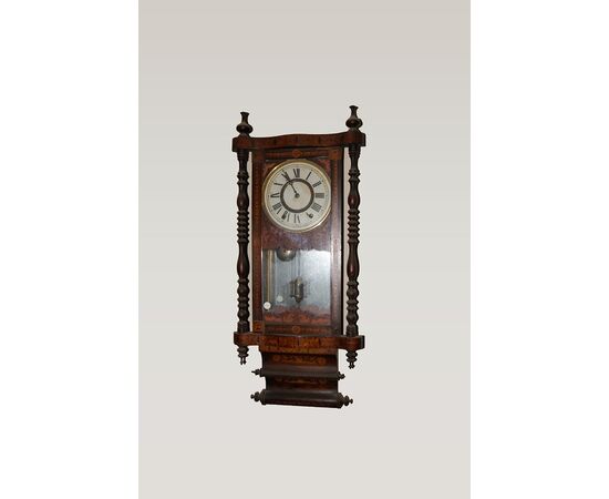 Richly inlaid wall clock from the 1800s     