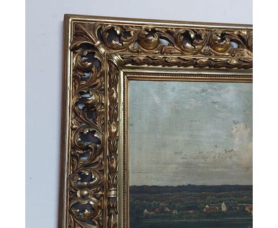 Dipinto olio su tela raffigurante un paesaggio con cornice intagliata e traforata 