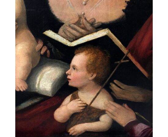 Madonna and Child, San Giovannino and patrons, Venetian school.     
