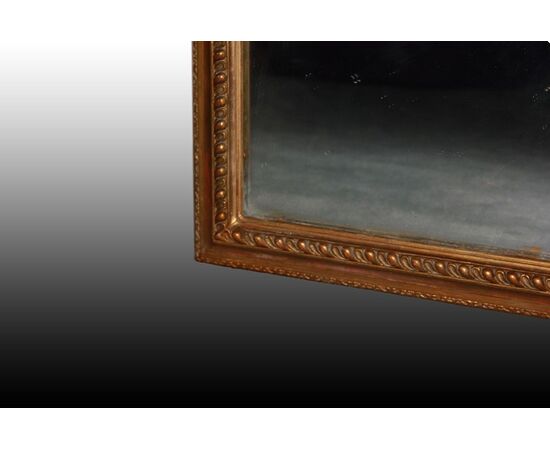 Grande specchiera stile Luigi XVI dorata rettangolare simmetrica XX secolo