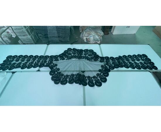 Finely embroidered black tulle shawl (some small flaws visible in the photo). Italy.     
