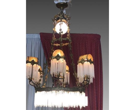 BRONZE AND CRYSTAL CHANDELIER     