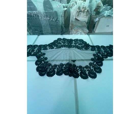 Finely embroidered black tulle shawl (some small flaws visible in the photo). Italy.     