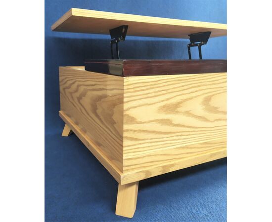 Coffee table in wood with opening and tilting top     