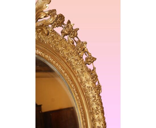 Specchiera ovale francese stile Luigi XV del 1800 dorata foglia oro 