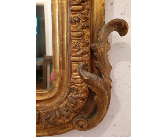 Mirror in gilded wood     