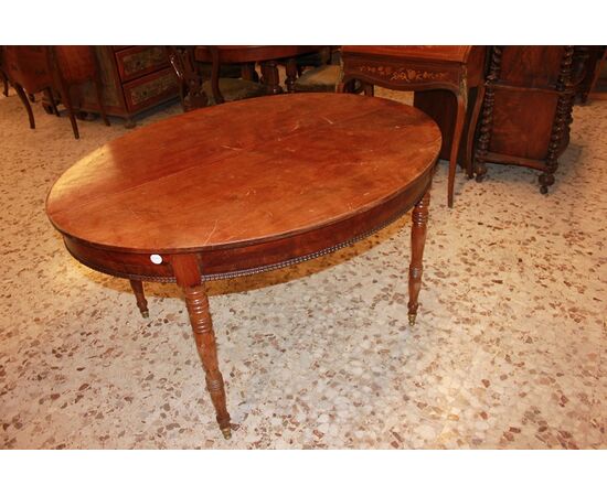 Tavolo ovale Luigi Filippo allungabile in legno di mogano