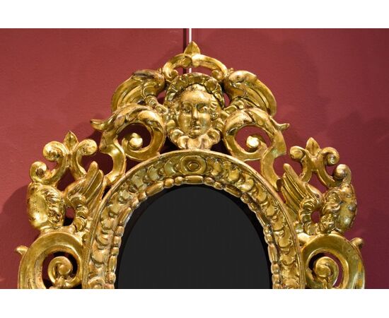 Coppia di specchiere intagliate e dorate ‘alla Sansovino’, Venezia XVIII secolo