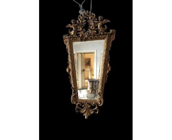 Golden mirror with molding