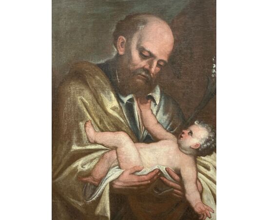 17th century painting, depicting Saint Joseph with Child, Emilian school. Cm 90 x 70     