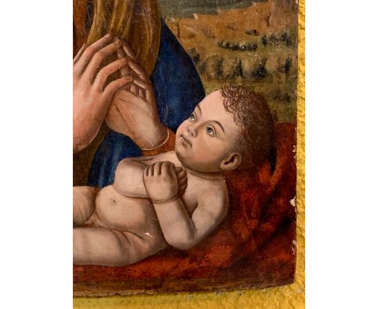 Panel painting depicting Madonna with Child.     