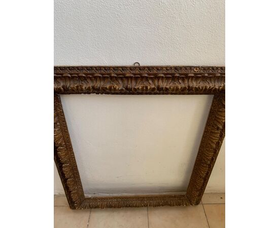 17th century frame in carved wood.     